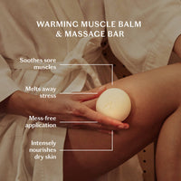 Person applying a warming muscle balm and massage bar to their arm with text highlighting its benefits.
