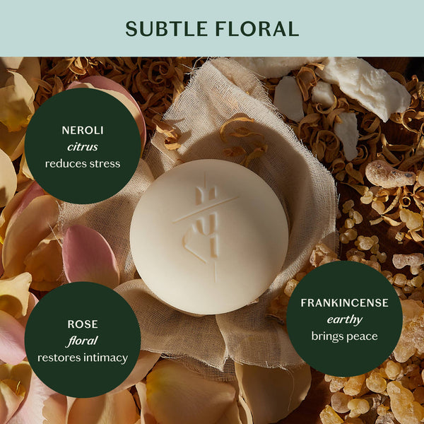 Soap bar with floral and natural elements on a light green background