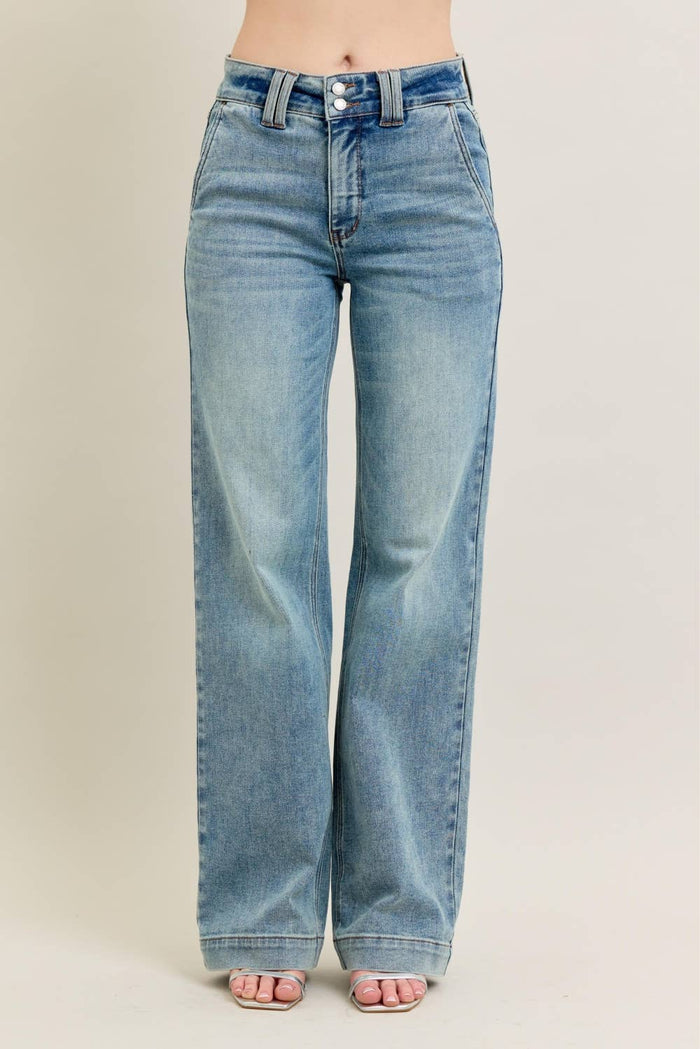 Light blue jeans on a plain background