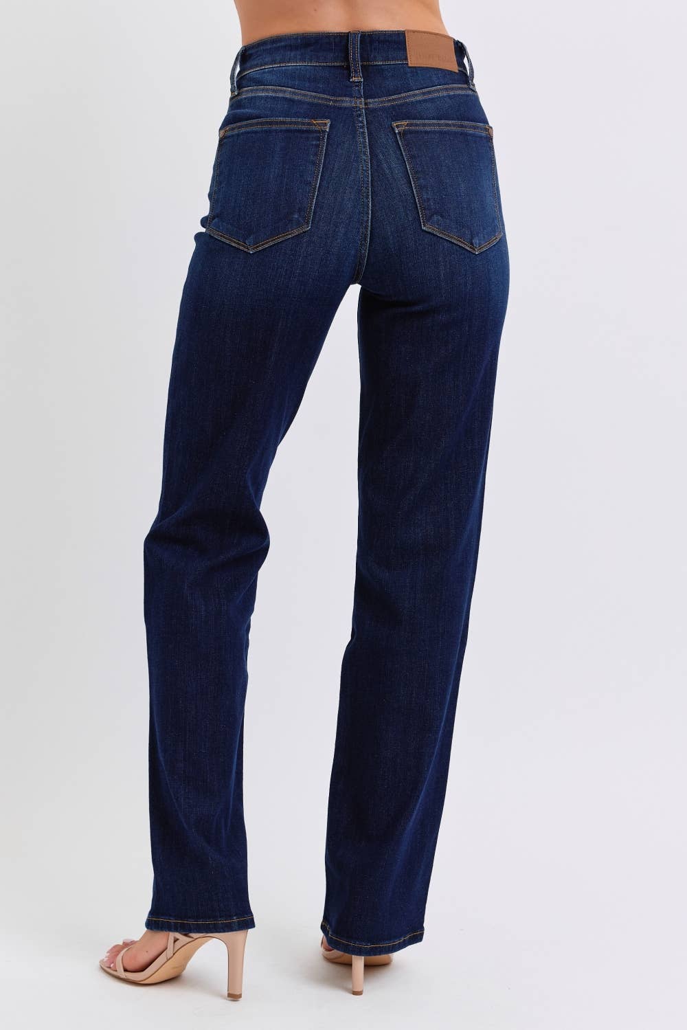 Dark blue jeans on a white background
