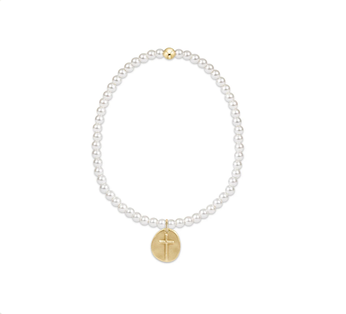 Pearl bracelet on white background with cross charm