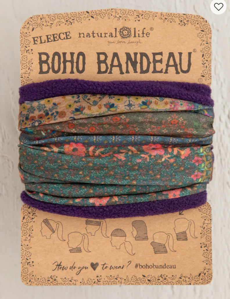 Boho bandeau with floral pattern and purple trim on a branded card.